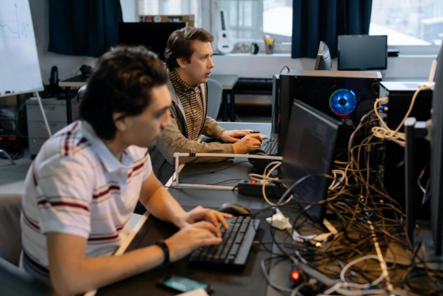 Students collaborating on algorithm problems during a structured learning session